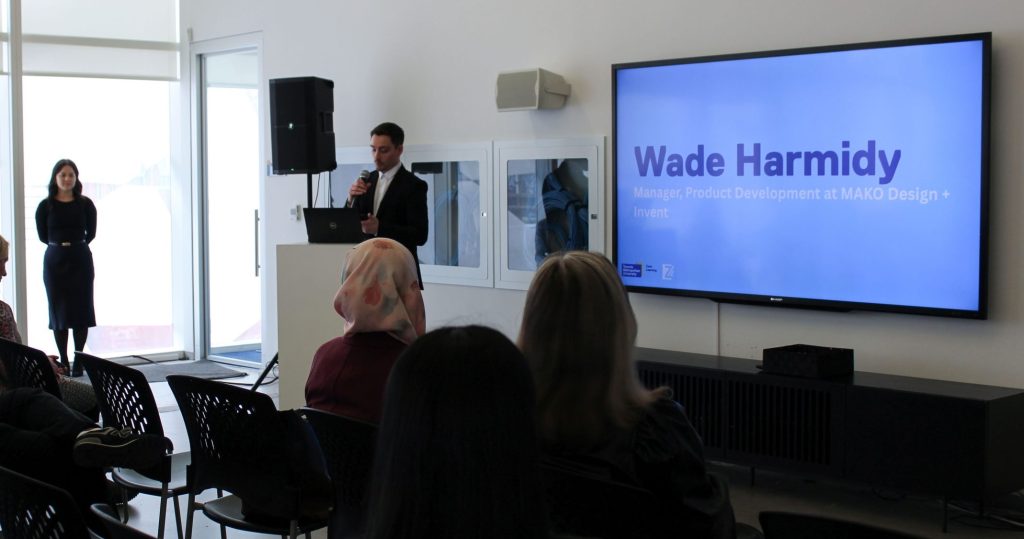 Wade Harmidy speaking to the audience