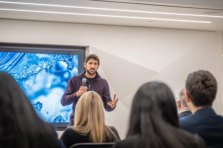 Kevin Mako Keynotes The Queen’s Entrepreneurs’ Competition 2022 1 Kevin Mako speaking at QEC competition for student invention makers